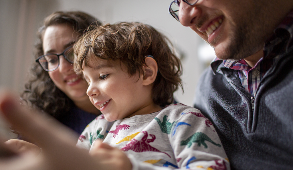 Parents reading to their child