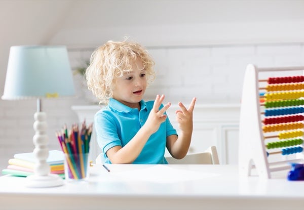 Child learning to build number sense at home