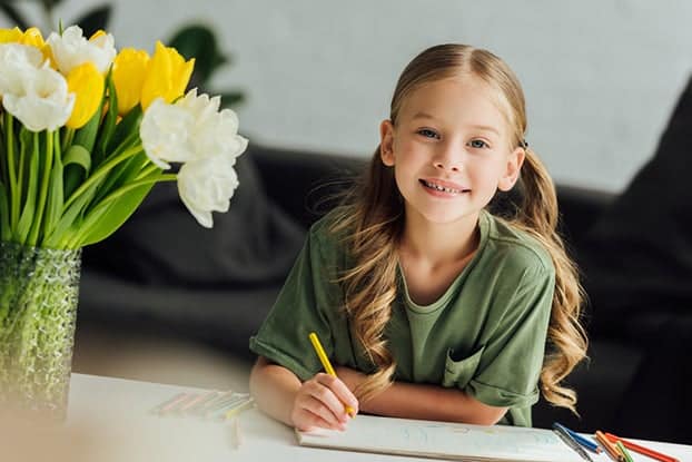 Young girl learning compound words for kids