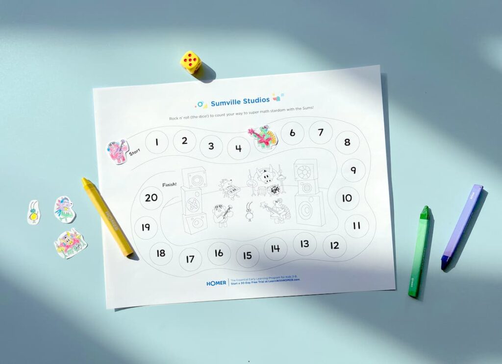 Completed Sumville Studios printable on blue table with crayons
