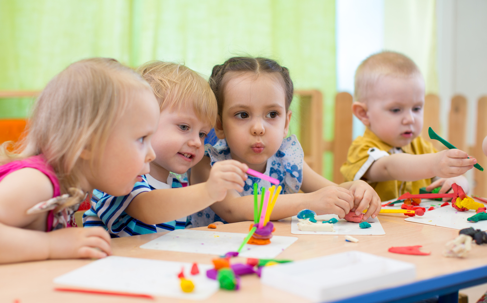 Group of kids making arts and crafts