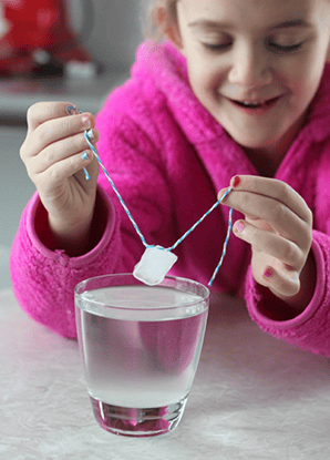 science activities for preschool - Use Ice and Salt to Make a Magic String