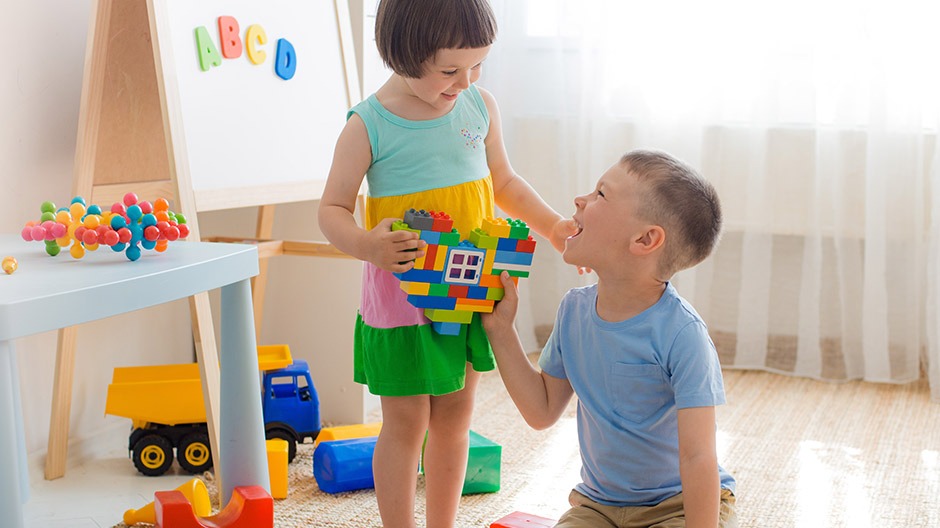Two joyful children playing and smiling