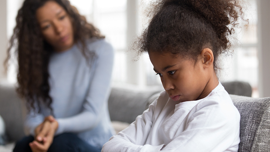 Mother helping daughter work through her emotions