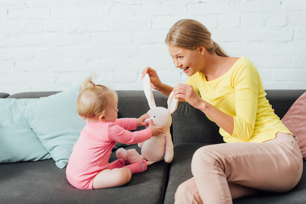 Mom playing with baby