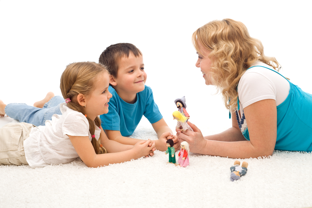 Mom with two kids who are following directions
