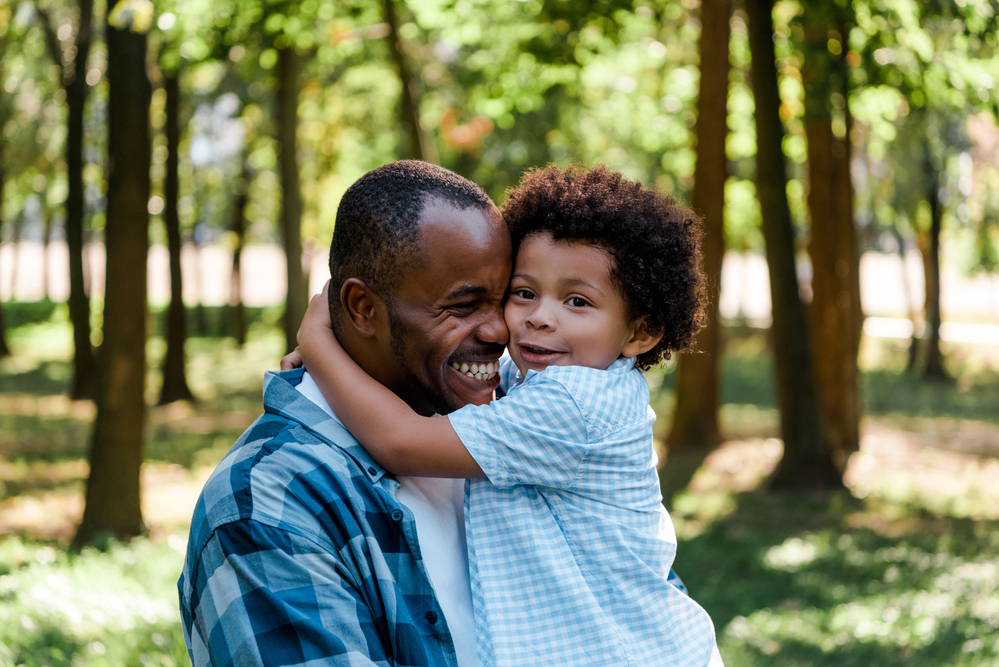 Dad praising child for following directions