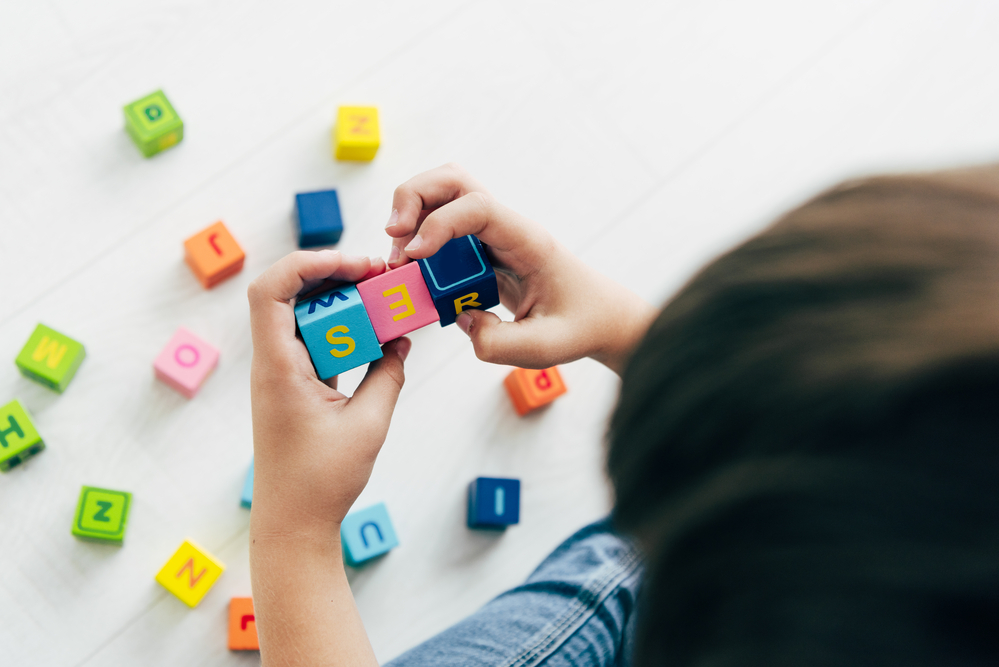 playing with blocks to learn letter sounds