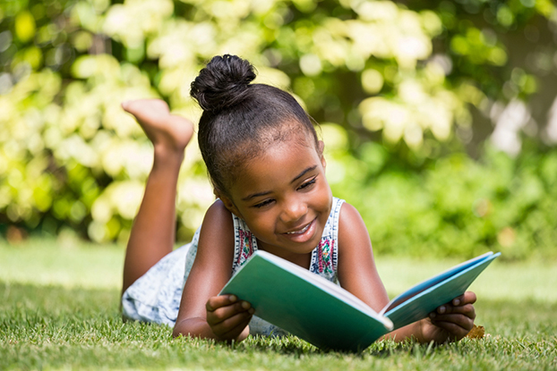 Young girl doing her 2nd grade reading