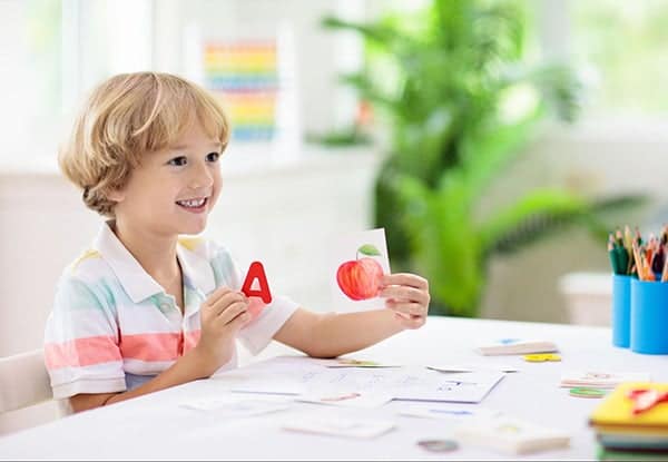 Kid learning what are sight words
