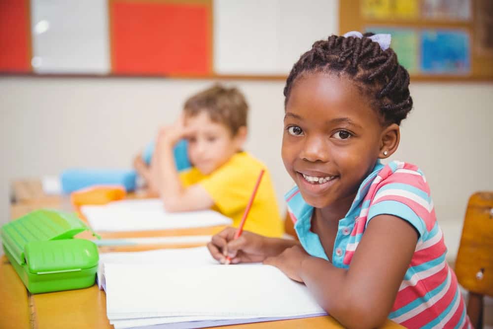young student practicing rhyming words for kindergarten