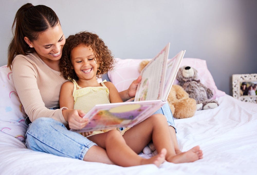 Mom reading to daughter