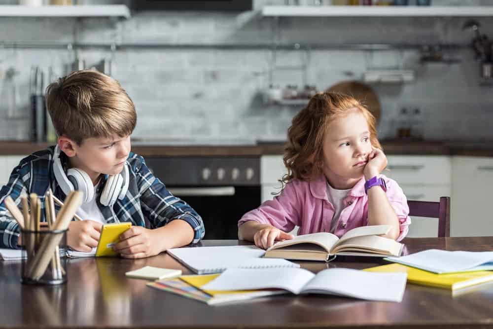 Two kids reading empathy quotes for kids