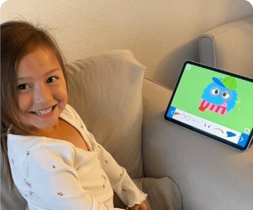 young girl learning on a tablet